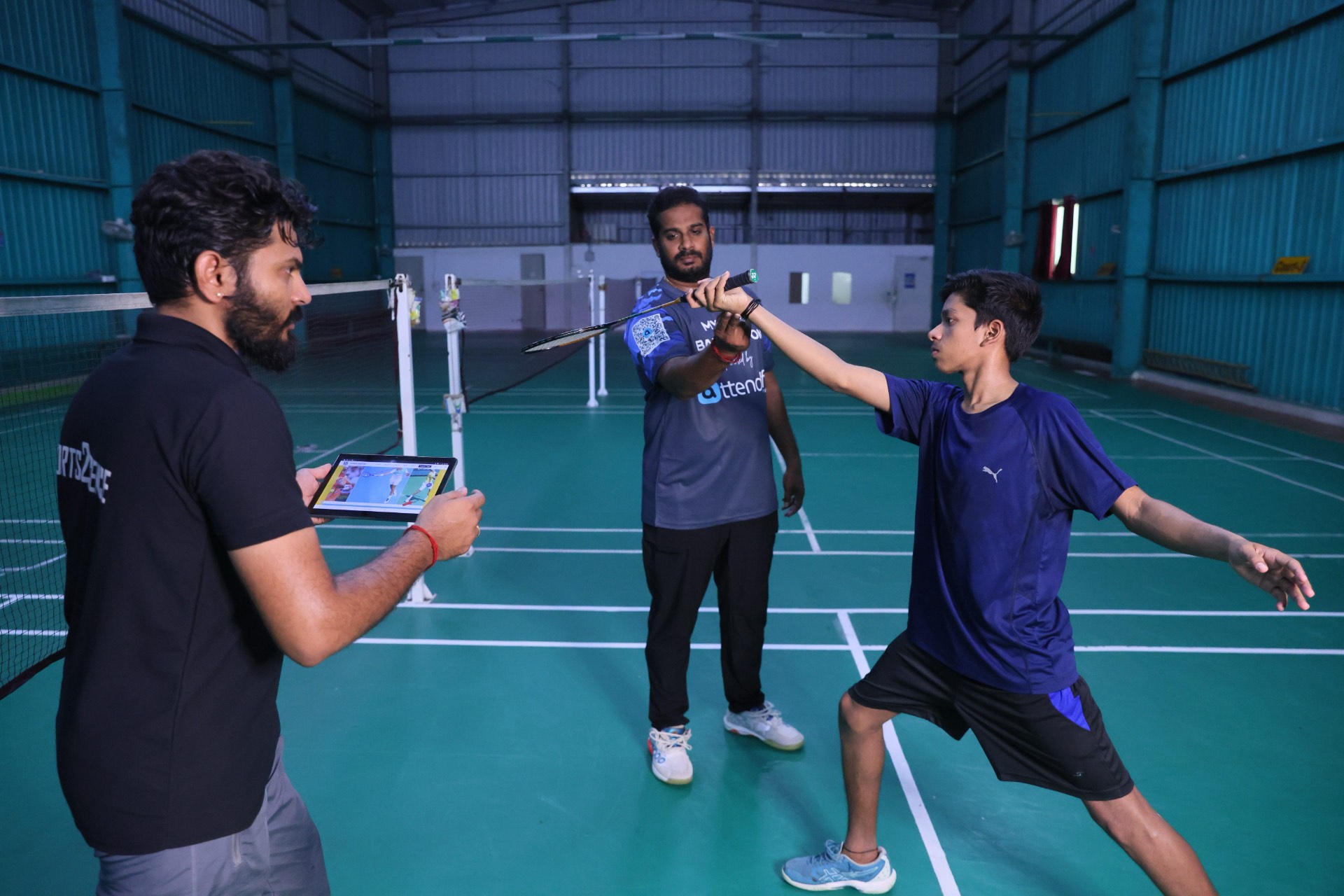 Coach working with athletes